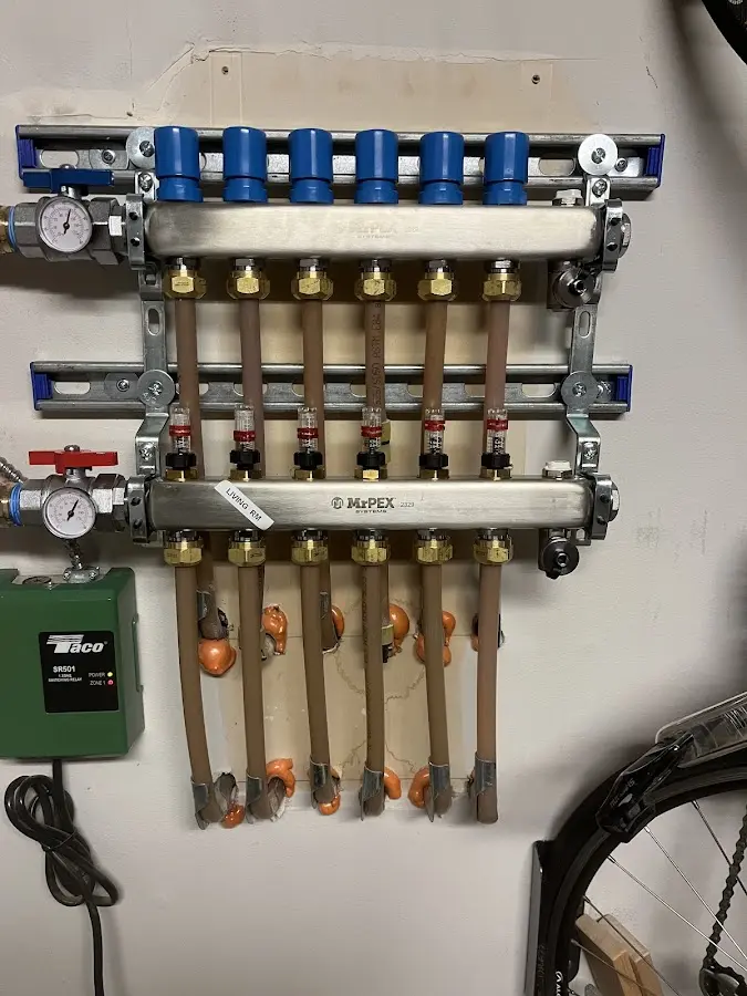 Plumber performing Water Heater Repair at a residential property in Newmarket